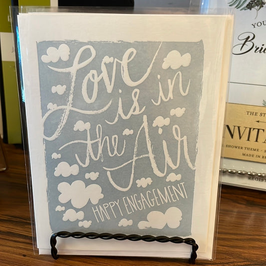 Love is in the air engagement card